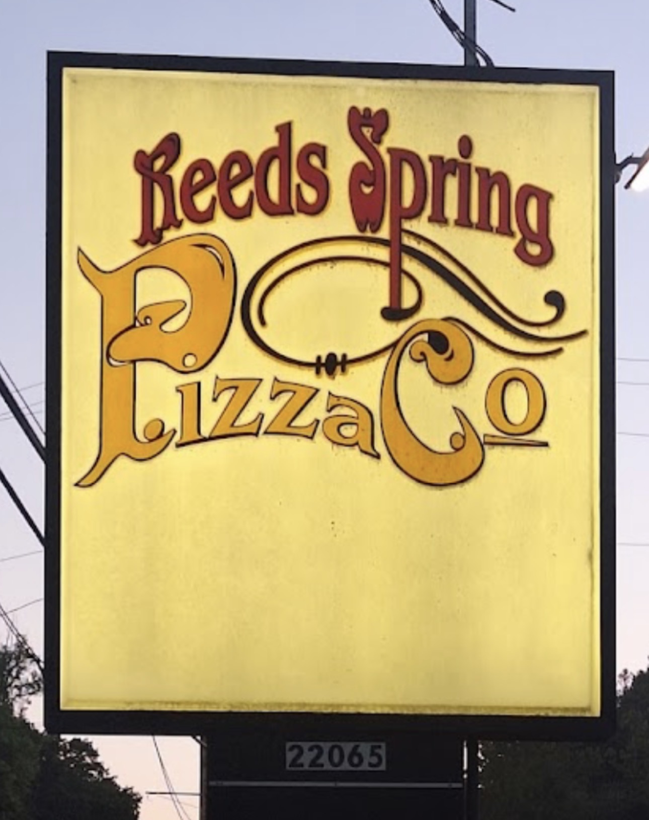 Reeds Spring Pizza Co sign